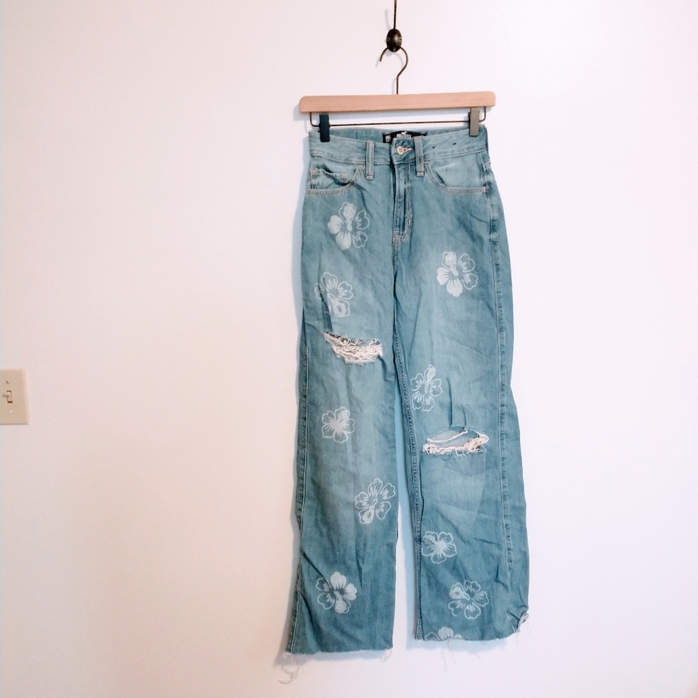 Hollister high rise vintage baggy jeans with sone distressing and floral print.